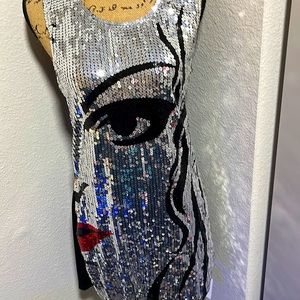 Hot to trot Sequenced face mini dress